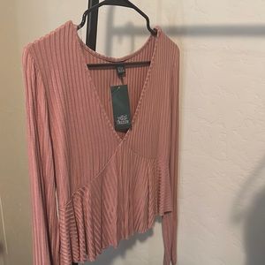 Long sleeve pink top with middle v cut